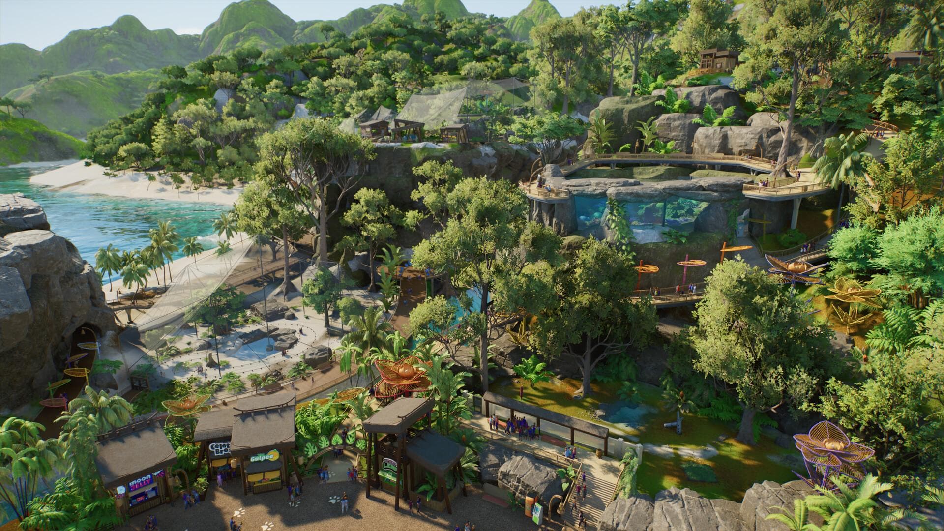 Planet Zoo 2 : vue aérienne d’un grand zoo avec enclos et allées